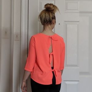 Coral open back with bows blouse size small